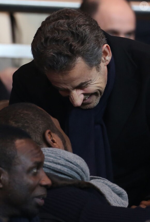 Nicolas Sarkozy et Teddy Riner lors du match entre le PSG et Lille (1-0) le 27 janvier 2012 au Parc des Princes à Paris