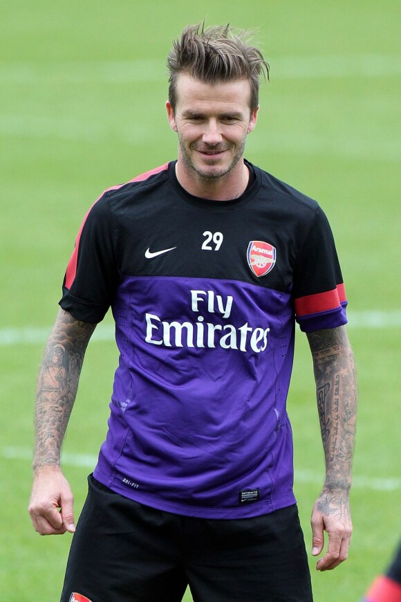 David Beckham et ses tatouages lors d'un entraînement avec l'équipe d'Arsenal, le 29 janvier 2013 au Shenley Training Center de Shenley, afin de garder la forme en attendant de trouver un nouveau club
