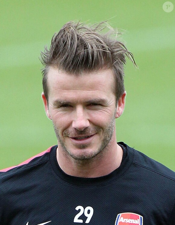 David Beckham et sa belle coupe de cheveux lors d'un entraînement avec l'équipe d'Arsenal, le 29 janvier 2013 au Shenley Training Center de Shenley, afin de garder la forme en attendant de trouver un nouveau club
