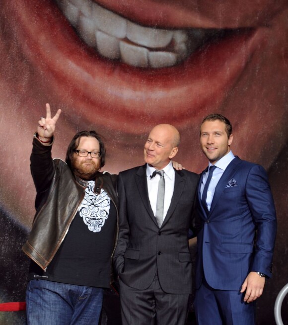John Moore, Bruce Willis et Jai Courtney face aux photographes pour la soirée des 25 ans de Die Hard à Los Angeles, le 31 janvier 2013.