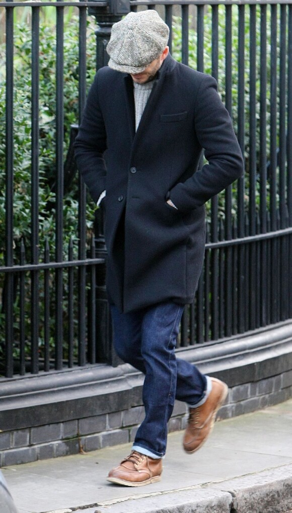 David Beckham dans les rues de Londres le 4 février 2013, simplement interrompu par une fan qui lui demandait une photo.