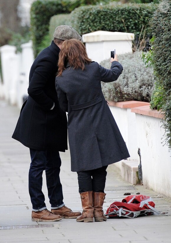 David Beckham, discret dans les rues de Londres le 4 février 2013, simplement interrompu par une fan qui lui demandait une photo.