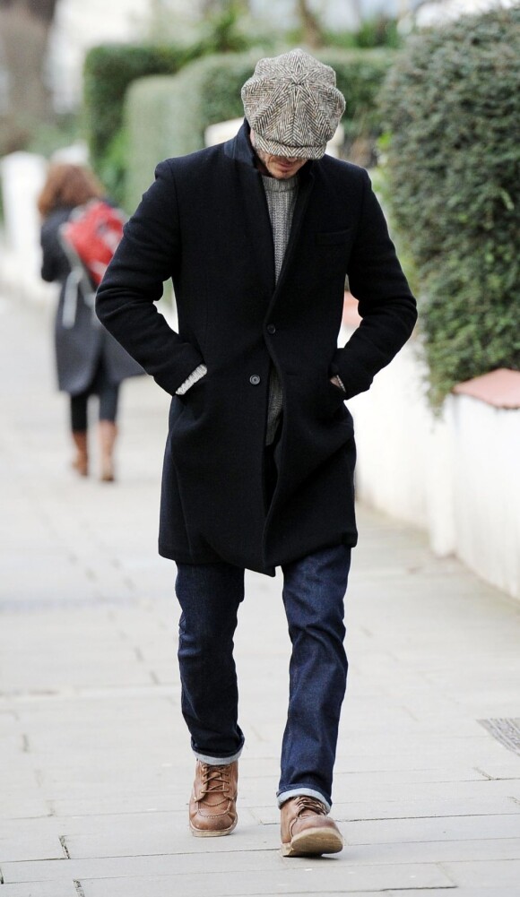 David Beckham surpris dans les rues de Londres le 4 février 2013, simplement interrompu par une fan qui lui demandait une photo.