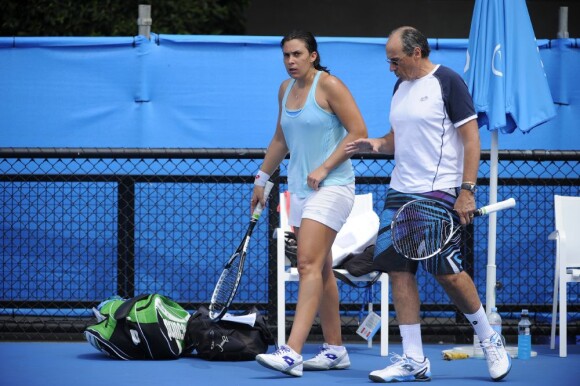 Marion Bartoli et son père Walter lors d'un entraînement avant l'Open d'Australie à Melbourne le 12 janvier 2013