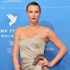 Charlize Theron, sublime dans une robe Gucci, lors du gala Cinema for Peace en parallèle de la Berlinale en Allemagne le 9 février 2013