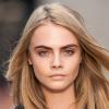 Cara Delevingne lors du défilé Burberry Prorsum automne-hiver 2013-2014 à Londres. Le 18 février 2013.