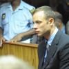 Oscar Pistorius au tribunal d'instance de Pretoria, premier jour d'audience pour sa demande de libération sous caution, le 19 février 2013.