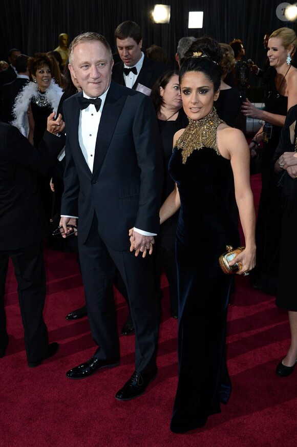 Salma Hayek et son mari Francois-Henri Pinault lors de la 85e cérémonie des Oscars le 24 février 2013