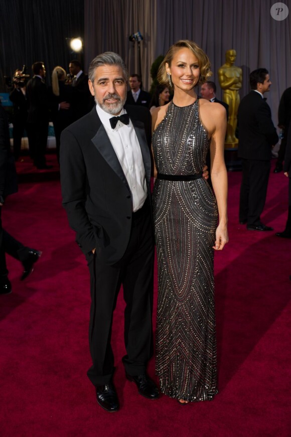Stacy Keibler et George Clooney lors de la 85e cérémonie des Oscars le 24 février 2013