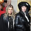 Fergie et Cher assistent au défilé Balmain automne-hiver 2013-2014 à la mairie de Paris. Le 28 février 2013.