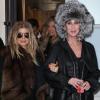 Les chanteuses Fergie et Cher quittent la boutique Rick Owens située dans la Galerie de Valois. Paris, le 28 février 2013.