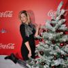 Sheryfa Luna, heureuse, lors de l'inauguration des vitrines de Noël Coca-Cola au Showcase à Paris le 26 Novembre 2012.