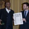 Bruno Julliard remet la médaille de Vermeil de la Ville de Paris à Oxmo Puccino dans les salons de l'Hôtel de Ville de Paris. Le 12 mars 2013.