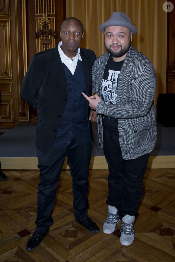 Oxmo Puccino et Raphäl Yem dans les salons de l'Hôtel de Ville de Paris, le 12 mars 2013.