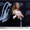 Anne Gravoin prend la pose lors de la soirée 2 000 Femmes chantent contre le cancer le 7 mars 2013 à l'Olympia