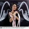 Karine Ferri prend la pose lors de la soirée évènement 2 000 Femmes chantent contre le cancer à l'Olympia le 7 mars 2013