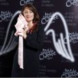 Daniela Lumbroso prend la pose lors de la soirée évènement 2 000 Femmes chantent contre le cancer à l'Olympia le 7 mars 2013