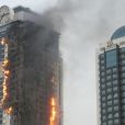 L'immeuble de 145 mètres dans lequel se trouvait le supposé appartement de Gérard Depardieu offert par le président tchétchène Ramzan Kadyrov a brûlé le 3 avril 2013 à Grozny.