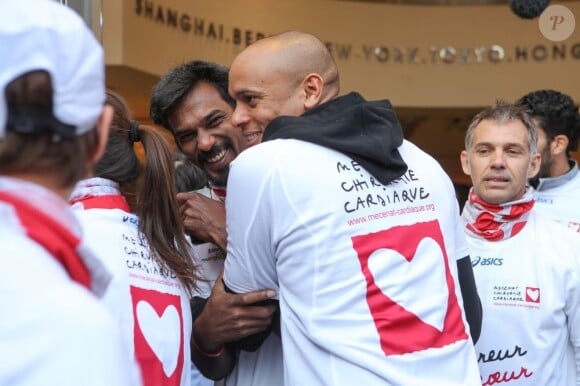 Marc Raquil et Satya Oblette au marathon de Paris le dimanche 7 avril 2013 pour courir sous les couleurs de Mécénat Chirurgie Cardiaque