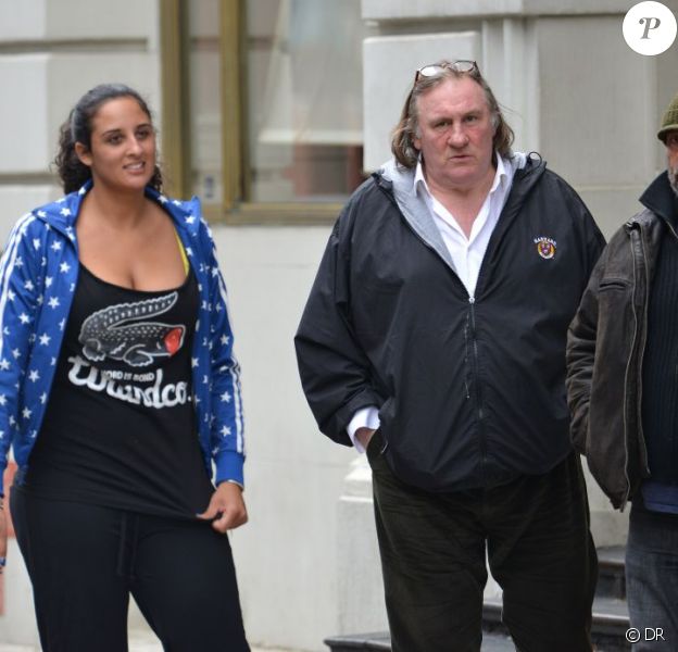 Gérard Depardieu, sa fille Roxane et Luc Besson dans les rues de New York le 13 avril 2013.