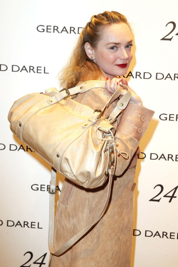 Julie Judd aux 10 ans du sac 24 heures de Gerard Darel à la boutique St Germain à Paris le 18 avril 2013