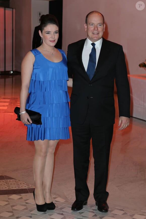 Albert II de Monaco et sa cousine Mélanie-Antoinette Costello de Massy. Soirée lors du Rolex Masters de Monte-Carlo, le 19 avril 2013