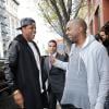 Kanye West et Jay-Z, souriants, se retrouvent dans le quartier de SoHo. New York, le 22 avril 2013.