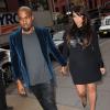 Kanye West et Kim Kardashian arrivent à l'hôtel Trump SoHo à New York, le 23 avril 2013.