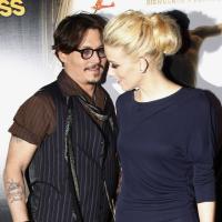 Johnny Depp et Amber Heard : Main dans la main au concert des Stones