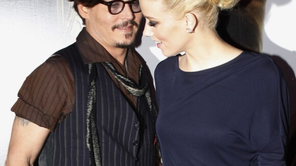 Johnny Depp et Amber Heard : Main dans la main au concert des Stones