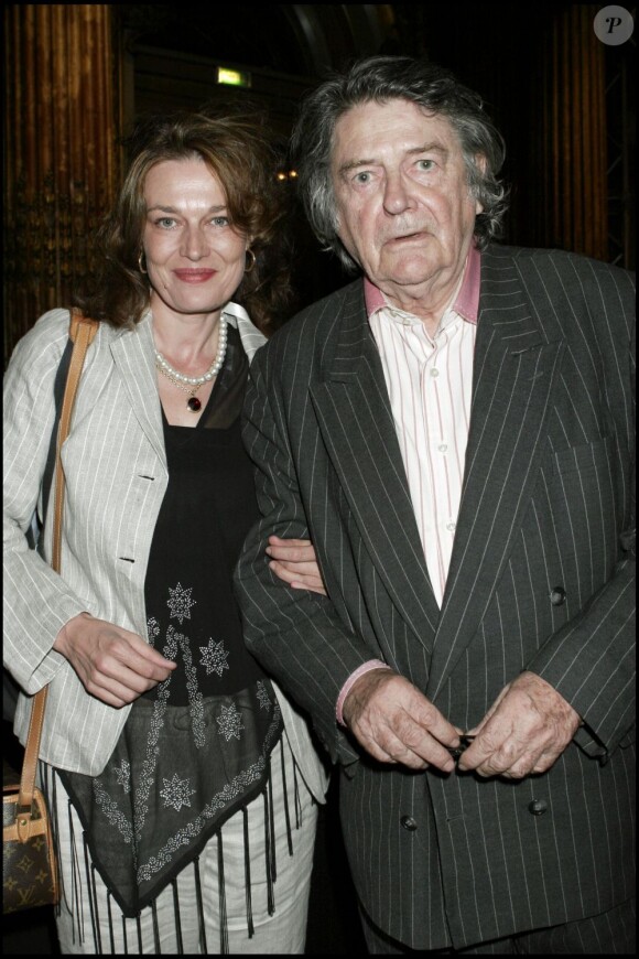 Jean-Pierre Mocky et Patricia Barzyk lors de la soirée de la créatrice Aline Buffet le 7 juillet 2005