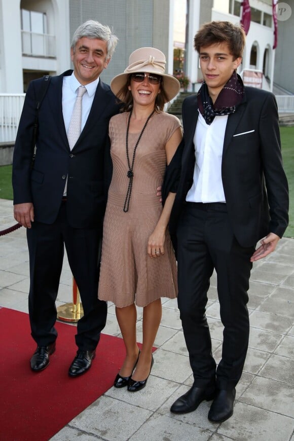 Hervé Morin, son fils Raphael et sa compagne Élodie Garamond, à la 91e édition du Prix de l'Arc de Triomphe 2012 à Longchamp, le 7 Octobre 2012.