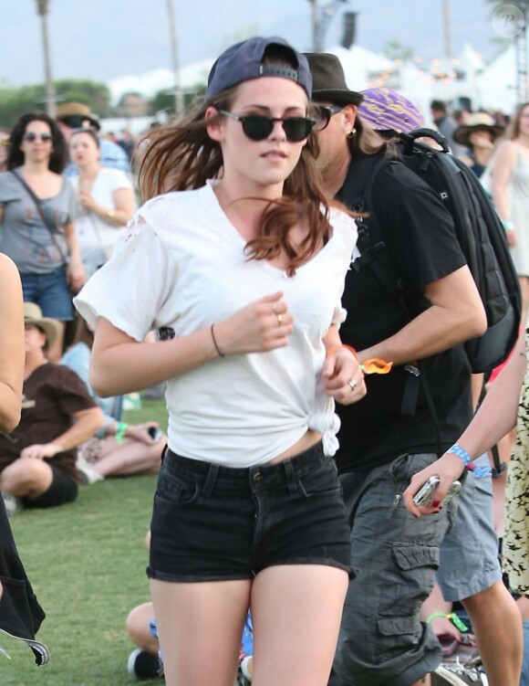 Kristen Stewart et son look tomboy qu'elle affiche ici, à Coachella en avril 2013