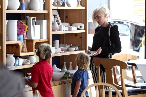 Please hide the children's faces prior to the publication Gwen Stefani takes her two boys Kingston and Zuma out for the afternoon in Los Angeles, CA, USA on May 8, 2013. The three started off with a mother and son bonding session making customized pottery at 'Color Me Mine' in Los Angeles. Afterwards Gwen took her tots out to buy some model's to build. Zuma chose a Star Wars space ship to build while Kingston opted for a police car model. Photo by GSI/ABACAPRESS.COM09/05/2013 - Los Angeles