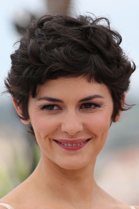 Audrey Tautou tout sourire pendant le photocall au 66e Festival de Cannes le 14 mai 2013.