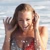 Nikki Leigh se baigne au cours d'un shooting avec le photographe Estevan Oriol sur une plage de Santa Monica. Le 14 mai 2013.