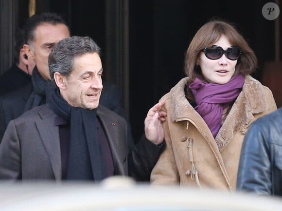 Nicolas Sarkozy et Carla Bruni à la sortie du Royal Monceau samedi 9 février 2013.