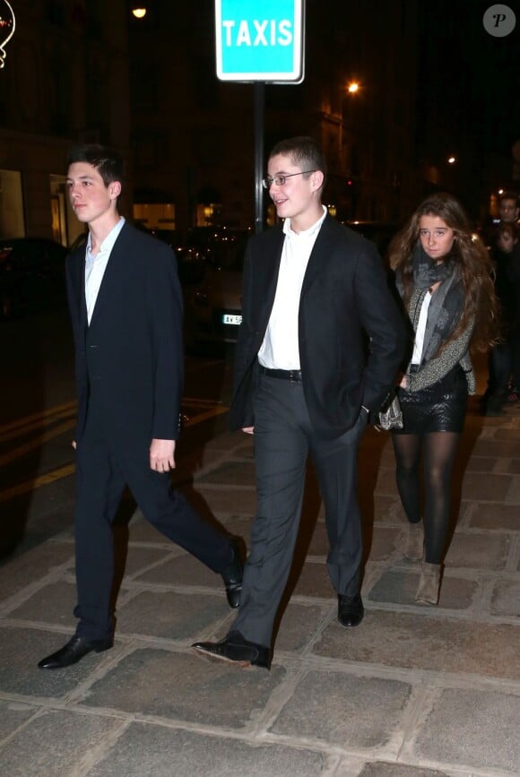 Louis Sarkozy (milieu) - Les invites arrivent a l'hôtel Bristol pour l'anniversaire de Carla Bruni qui fete ses 45 ans, le 23 decembre 2012.