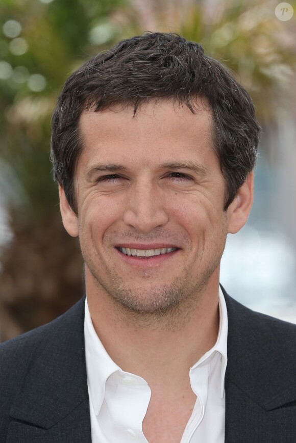 Guillaume Canet souriant au photocall du film Blood Ties au 66e Festival du film de Cannes, le 20 mai 2013.