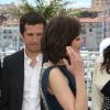 Guillaume Canet et Marion Cotillard pendant le photocall du film Blood Ties au 66e Festival du film de Cannes, le 20 mai 2013.