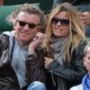 L'animateur Denis Brogniart et sa femme Hortense assistent au match de Gaël Monfils au 2e Tour des Internationaux de France de tennis de Roland Garros le 29 mai 2013