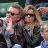 Denis Brogniart et sa femme Hortense assistent au match de Gaël Monfils au 2e Tour des Internationaux de France de tennis de Roland Garros le 29 mai 2013