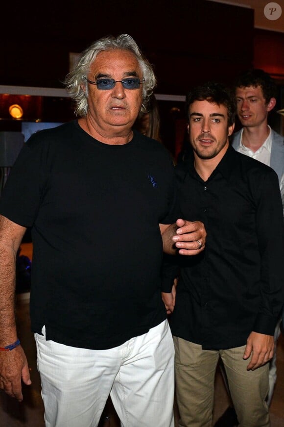 Flavio Briatore et Fernando Alonso lors d'une soirée au Billionaire, club de Flavio Briatore, situé au Fairmont Hotel de Monte Carlo le 26 mai 2013