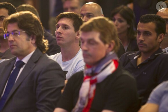 Lionel Messi lors de la conférence de presse d'adieu d'Eric Abidal à Barcelone le 30 mai 2013