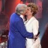 Jeane Manson et Patrick Sébastien partagent un baiser lors de l'enregistrement de l'émission "Les Années bonheur" qui sera diffusée par France 2, le 8 Juin 2013.