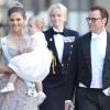 La princesse Victoria et le prince Daniel de Suède avec la princesse Estelle au mariage de la princesse Madeleine et Chris O'Neill à Stockholm, le 8 juin 2013.