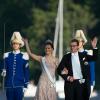 La princesse Victoria et le prince Daniel de Suède sur le chemin de Drottningholm pour la réception du mariage de la princesse Madeleine et Chris O'Neill, le 8 juin 2013.