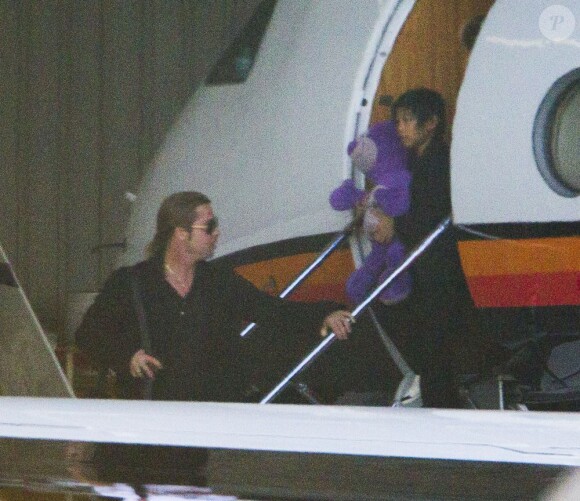 Brad Pitt arrive avec Pax pour la première australienne de World War Z à Sydney, le 9 juin 2013.