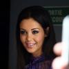 Nabilla Benattia, ravissante et souriante, à la sortie de NRJ 12 à Paris le 5 juin 2013