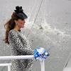 Kate Middleton, armée d'un nabuchodonosor de Moët & Chandon pour baptiser The Royal Princess à Southampton le 13 juin 2013, sa dernière mission officielle avant de débuter son congé maternité.